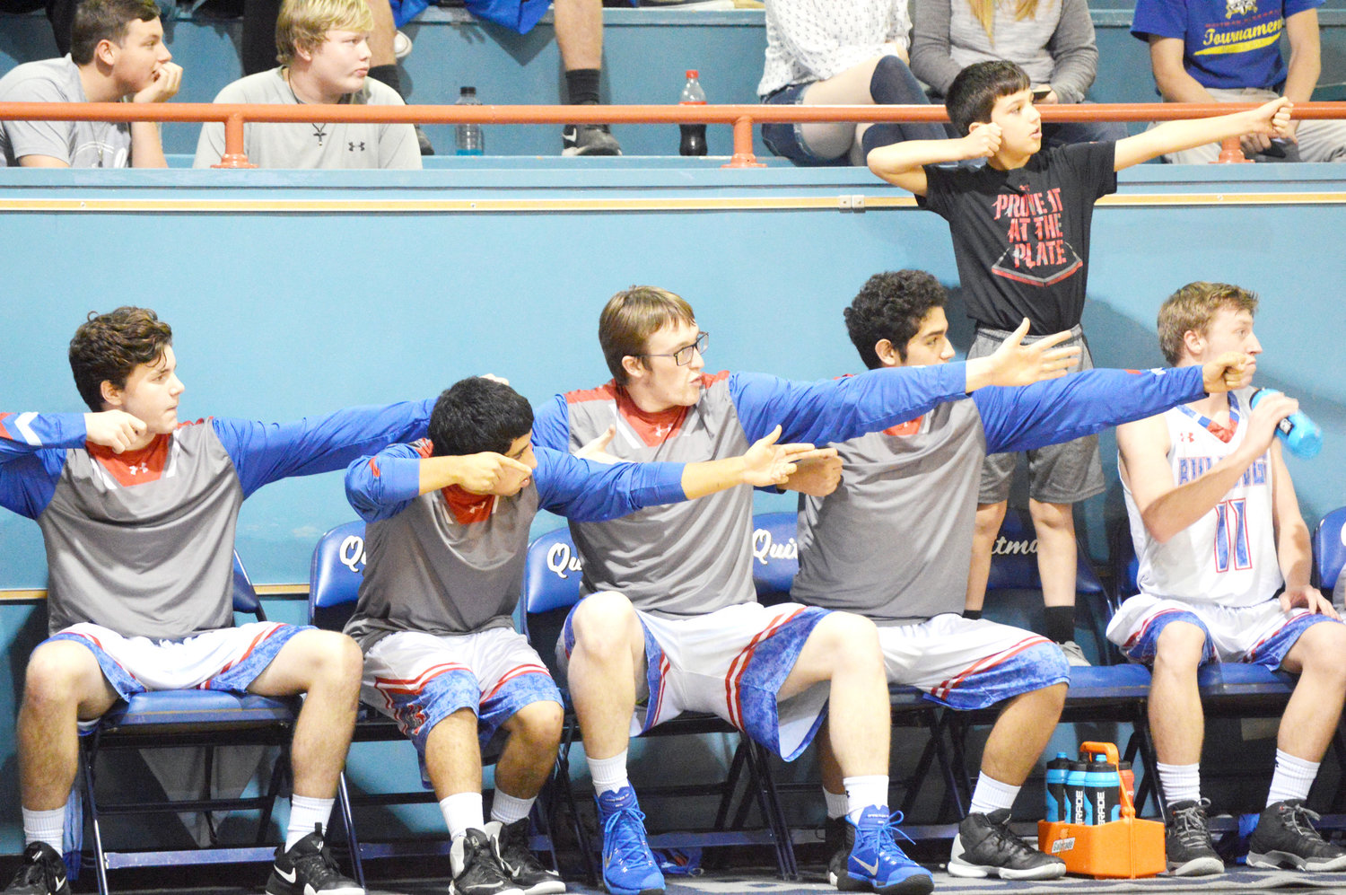 Members of the Quitman Bulldogs get ready to pull the trigger for a teammate at the free throw line in the Kemp game. They are, from left, Luke Pruden, Jose Delgadillo, Brian McDade, Javier Roman, Cort Reid and Garrett Peek who is taking a break. (Monitor photo by Larry Tucker)