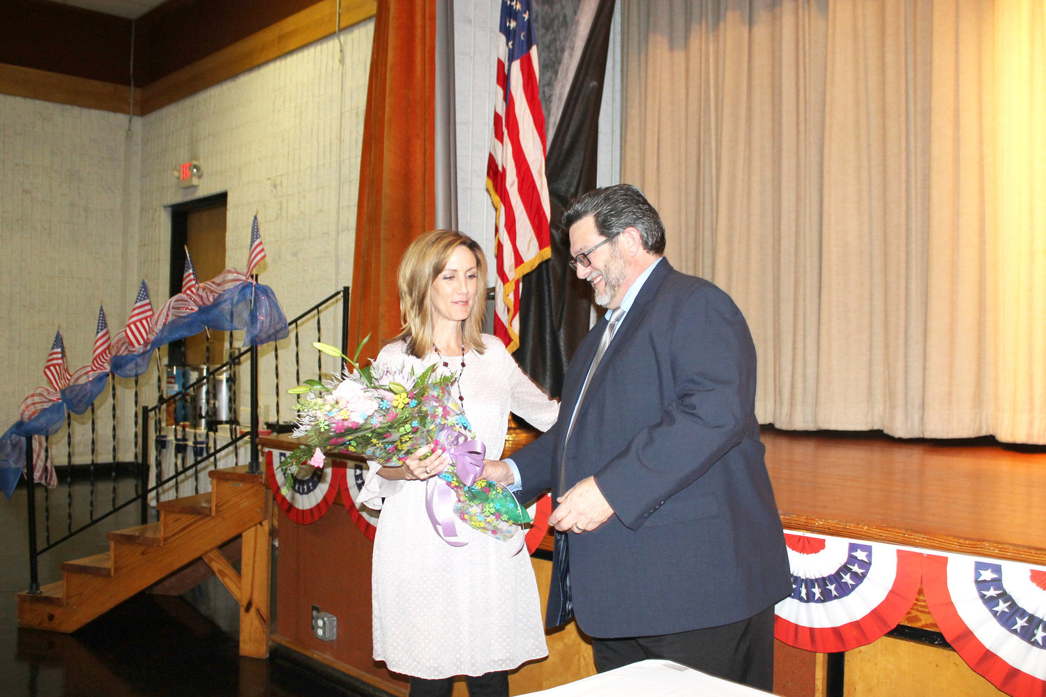 Kellam Newell presented elementary Teacher Kimberly Witt with Teacher of the Year.