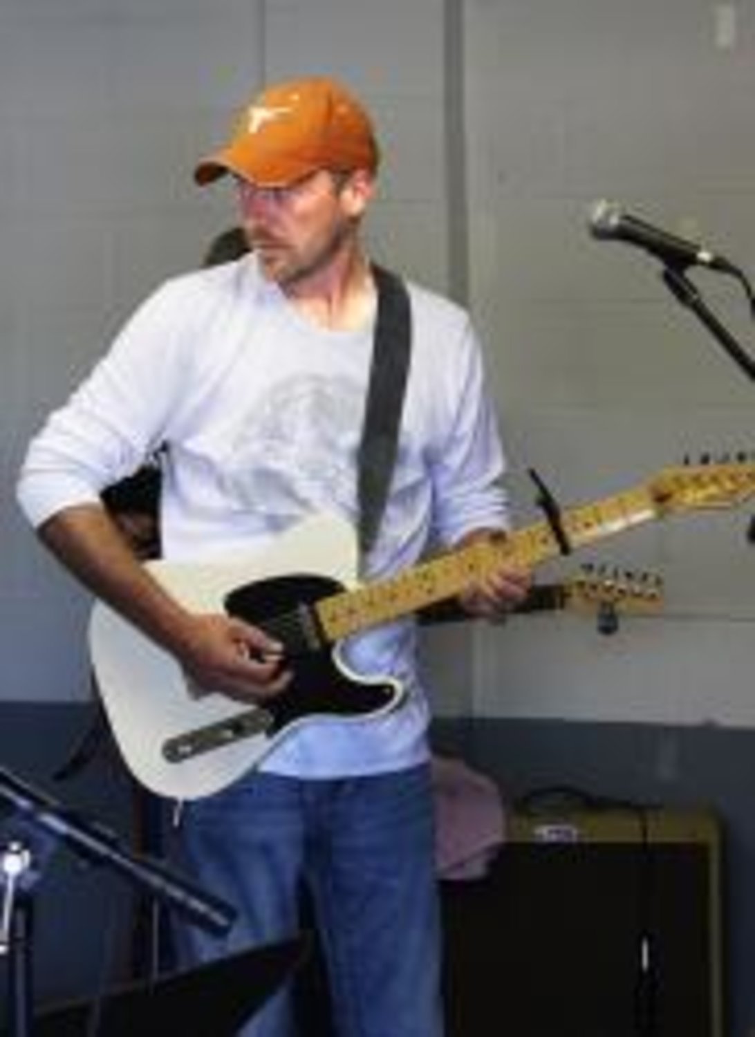 Billy Jack Richardson, rhythm guitarist, practices with the four other members of the band. Richardson has played guitar for more than 20 years.