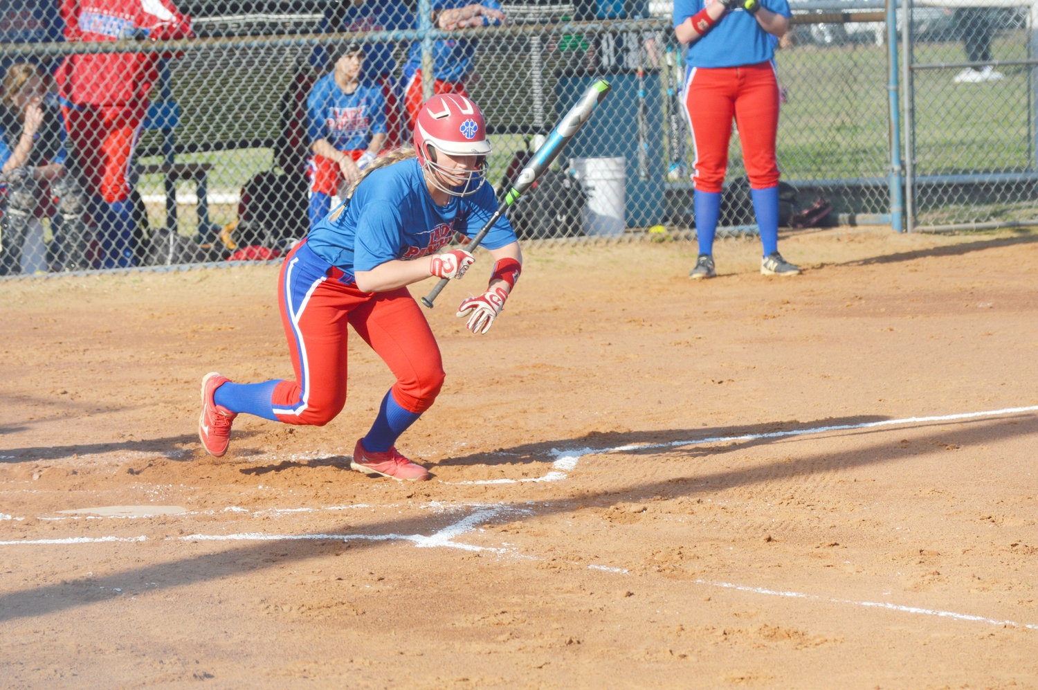 Alba-Golden’s Brianna Weissert takes off after getting a hit in the Lady Panthers’ close win over Quitman last week. (Monitor photos by Larry Tucker)
