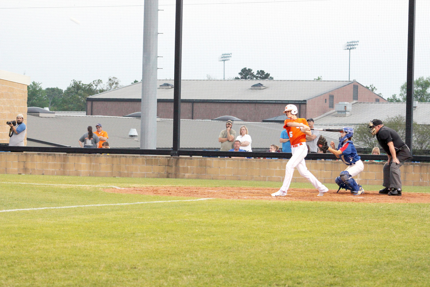 Mineola’s Cody Ford (5) gets a healthy swing in the Jackets 6-3 win over Quitman last Tuesday.