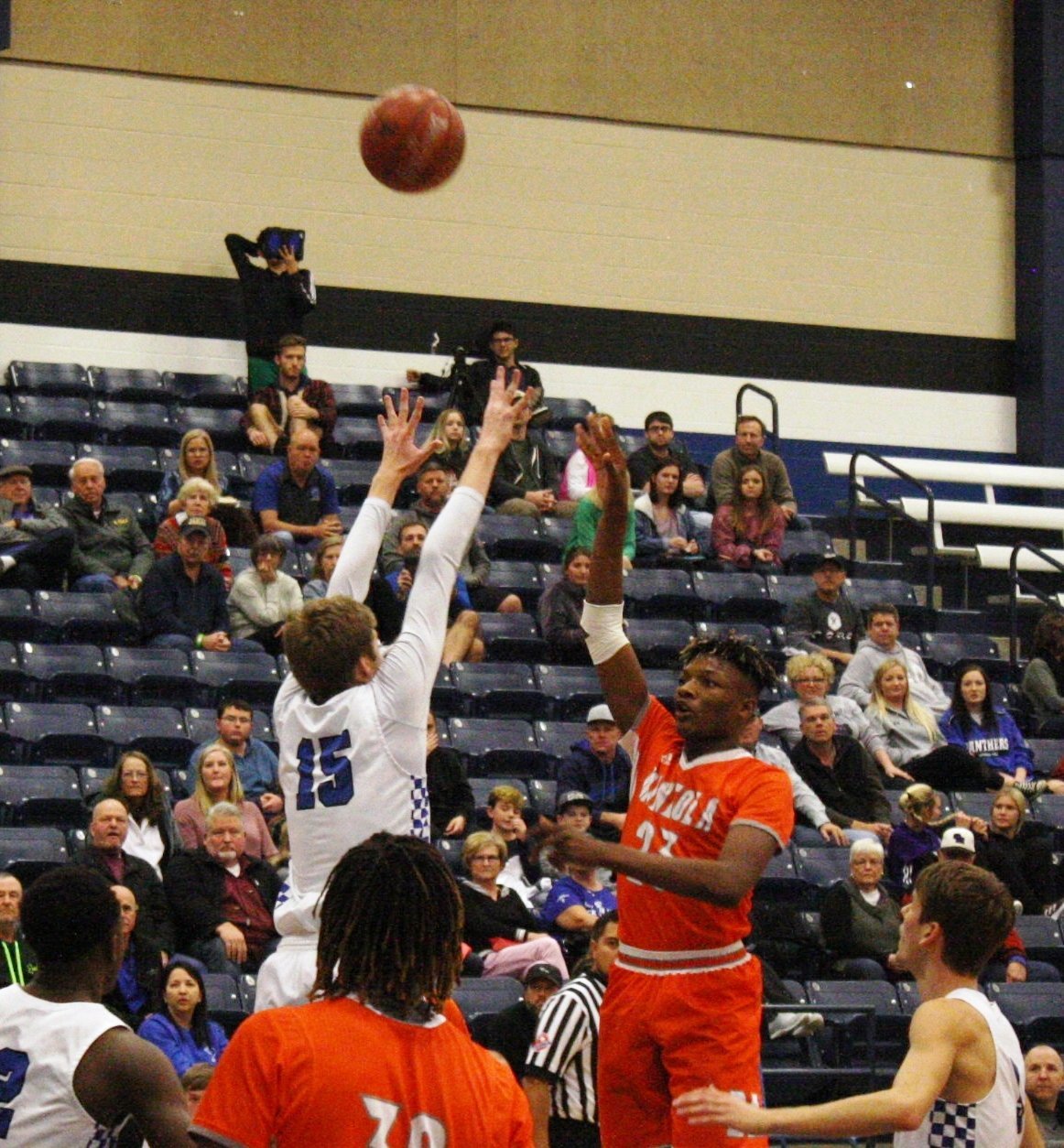 Yellowjacket Kadavian George puts up a shot against Spring Hill.
