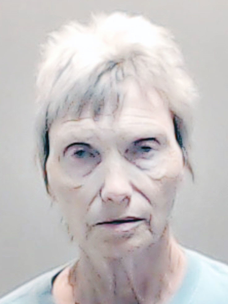 Jewel “Faye” Payne is jailed on trying to get someone to threaten an EMT who responded to the scene of the murders for which her son was convicted.