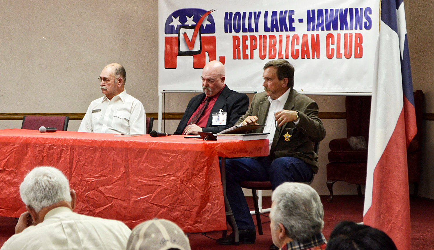 Wood County sheriff’s candidates, from left, James Schaffner, Kelly Cole and Tom Castloo field questions during a forum at Holly Lake Ranch Monday. Callie Lawrence was unable to attend.