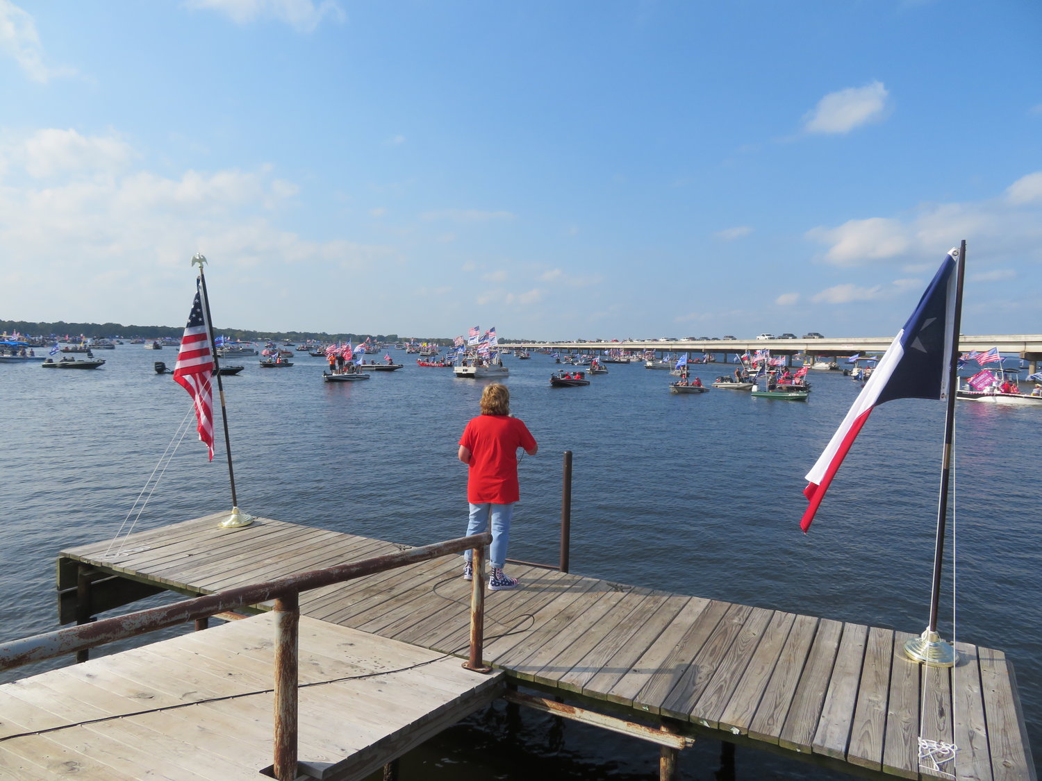 Wood County Republican Party chairman Jana Castloo addresses boaters during Saturday’s flotilla on Lake Fork. (Courtesy photo)