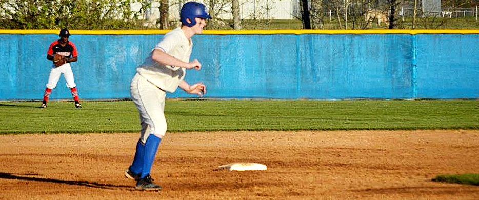 Quitman Bulldog Landon Richey gets a lead off second base after pounding a double to right center in Friday’s loss to Winnsboro.