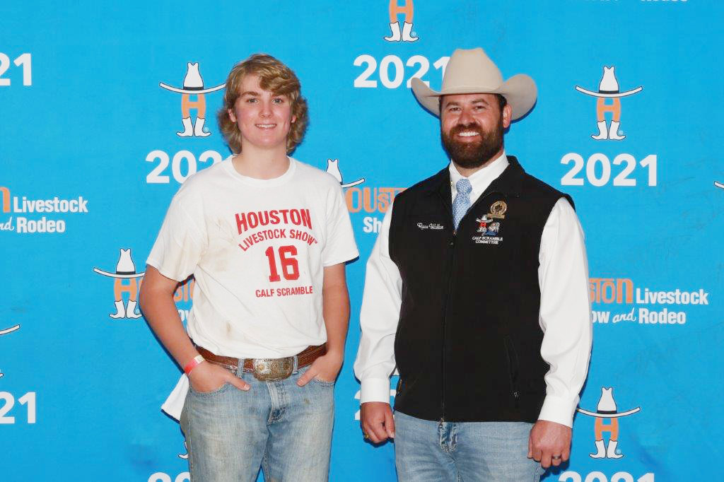 Parker Simpkins with a calf scramble representative standing in for Sponsor Charles G. Hooks, IV.