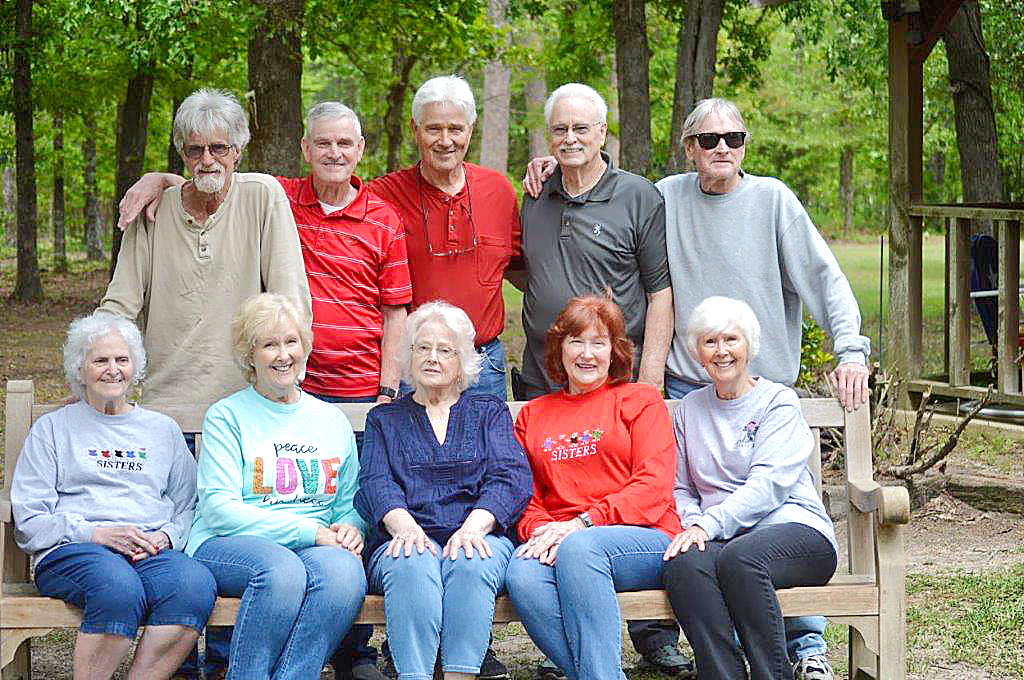 The 10 siblings in the Pennington clan get together twice a year in Hainesville. They are sisters (seated, left to right) Dewere Thompson, Yvonne Ross, Elaine Gillis, Brenda Coley and Ann Cooper. The Pennington brothers are (standing) Lynn, Donald, Jerry, Charles and Jackie.