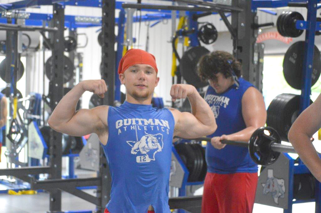 Quitman Bulldog Wyatt Hightower is one of many Quitman Bulldogs who hit the weights at 7 a.m. each morning this summer.