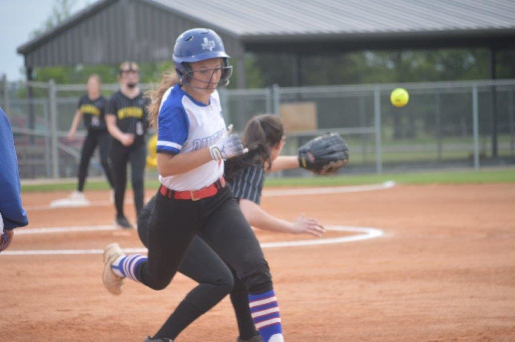 Quitman’s Larkin Spears beats the throw to first base. The talented freshman had two hits in the Lady Bulldog’s 15-0 win over Winona.