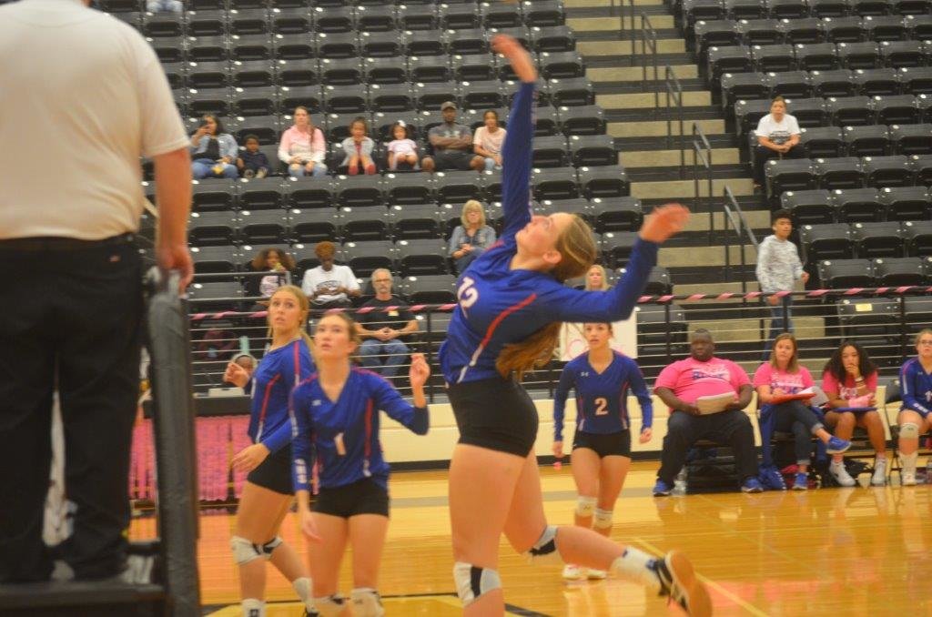 Quitman’s Kaylee Wood (12) goes up for a kill in the Lady Bulldogs win at Winona last Friday.