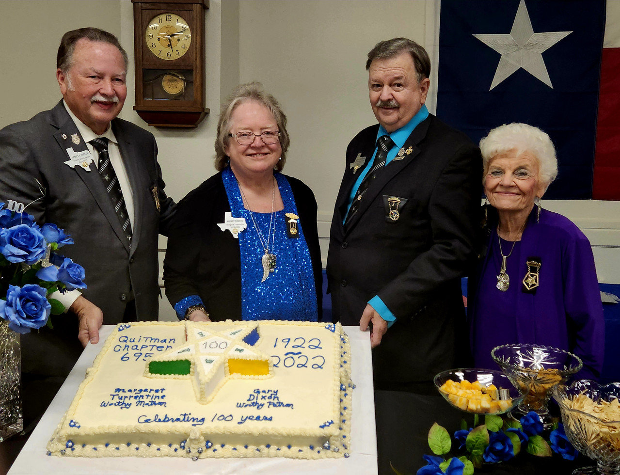 From left, James R. Parker, Worthy Grand Patron; Margaret Turrentine, Worthy Matron; Gary Dixon, Worthy Patron; and Phyllis Macon, Worthy Grand Patron with the 100th anniversary cake.