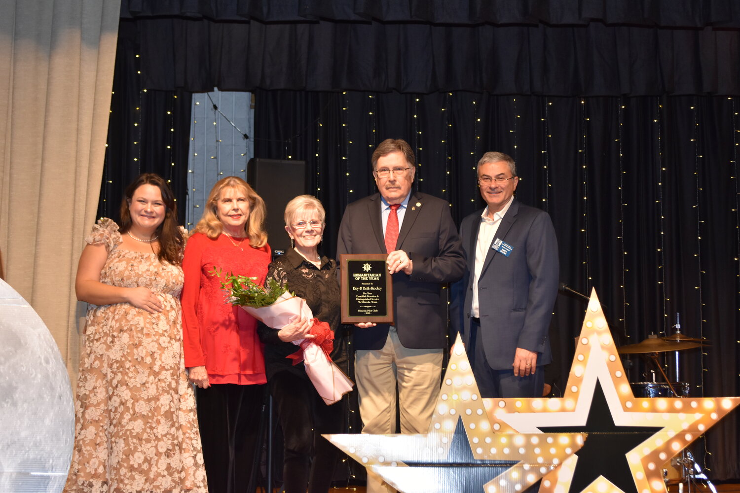 Beth and Roy Shockey earned the Humamnitarian of the Year award at the annual Mineola Chamber banquet last week. From left are Chamber President Kelsie McGilvray, Pilot Club of Mineola presenter Joyce Curry, the Shockeys and Chamber Vice President Daren Beaudo.