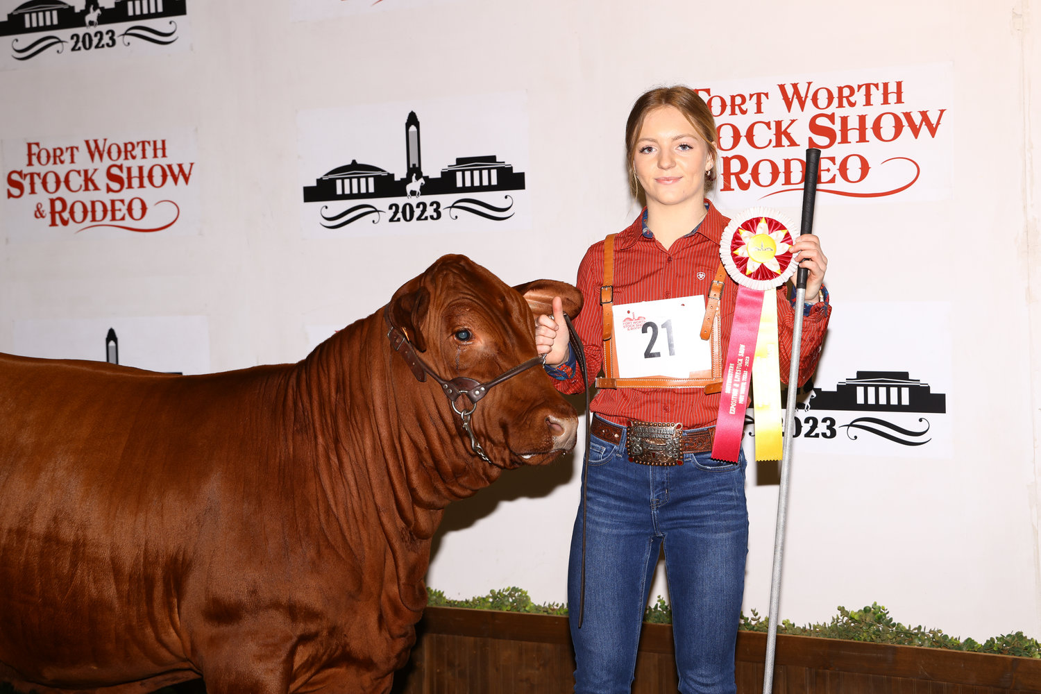Cacie Lennon of Alba-Golden High School with her winning junior heifer entry in the Fort Worth Stock Show.