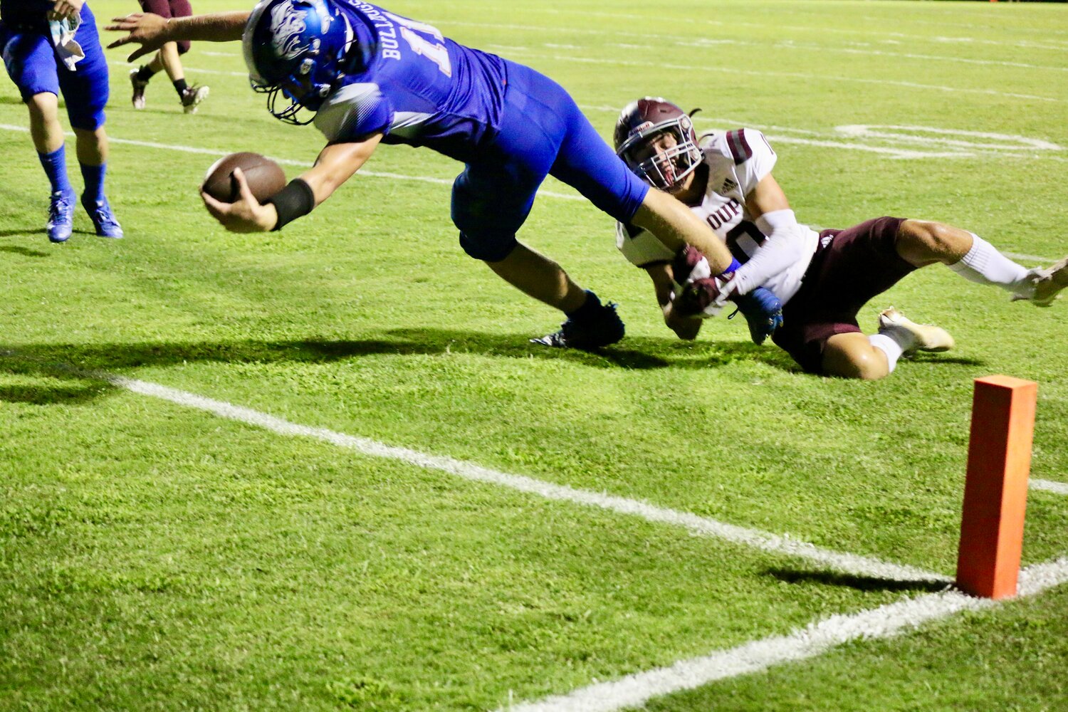 Klayton Meadows of Quitman dives for the end zone against Troup Friday.